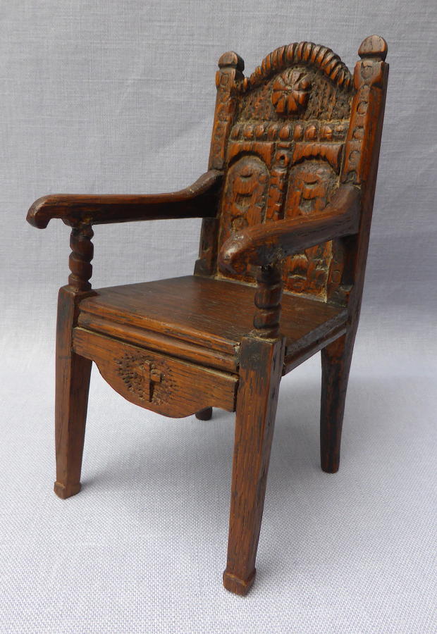 Late 19th century miniature carved wainscot chair
