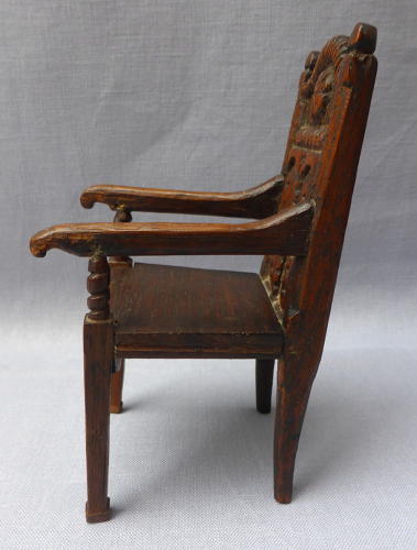 Late 19th century miniature carved wainscot chair