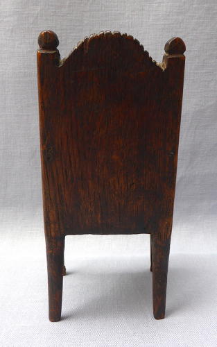 Late 19th century miniature carved wainscot chair