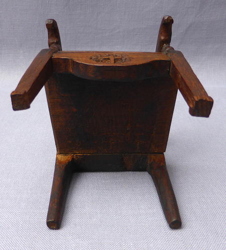 Late 19th century miniature carved wainscot chair