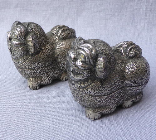 Pair of Cambodian silver Foo lion dog betel nut boxes