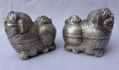 Pair of Cambodian silver Foo lion dog betel nut boxes