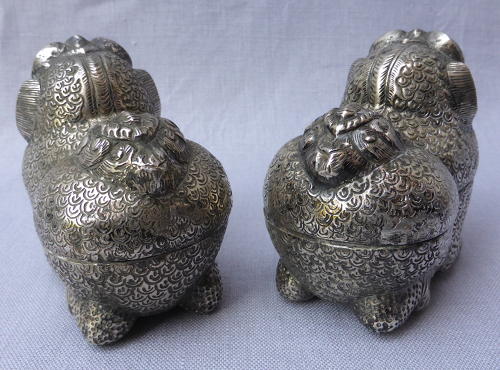 Pair of Cambodian silver Foo lion dog betel nut boxes