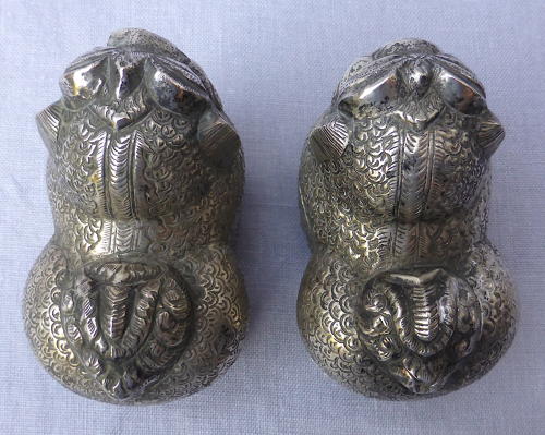 Pair of Cambodian silver Foo lion dog betel nut boxes