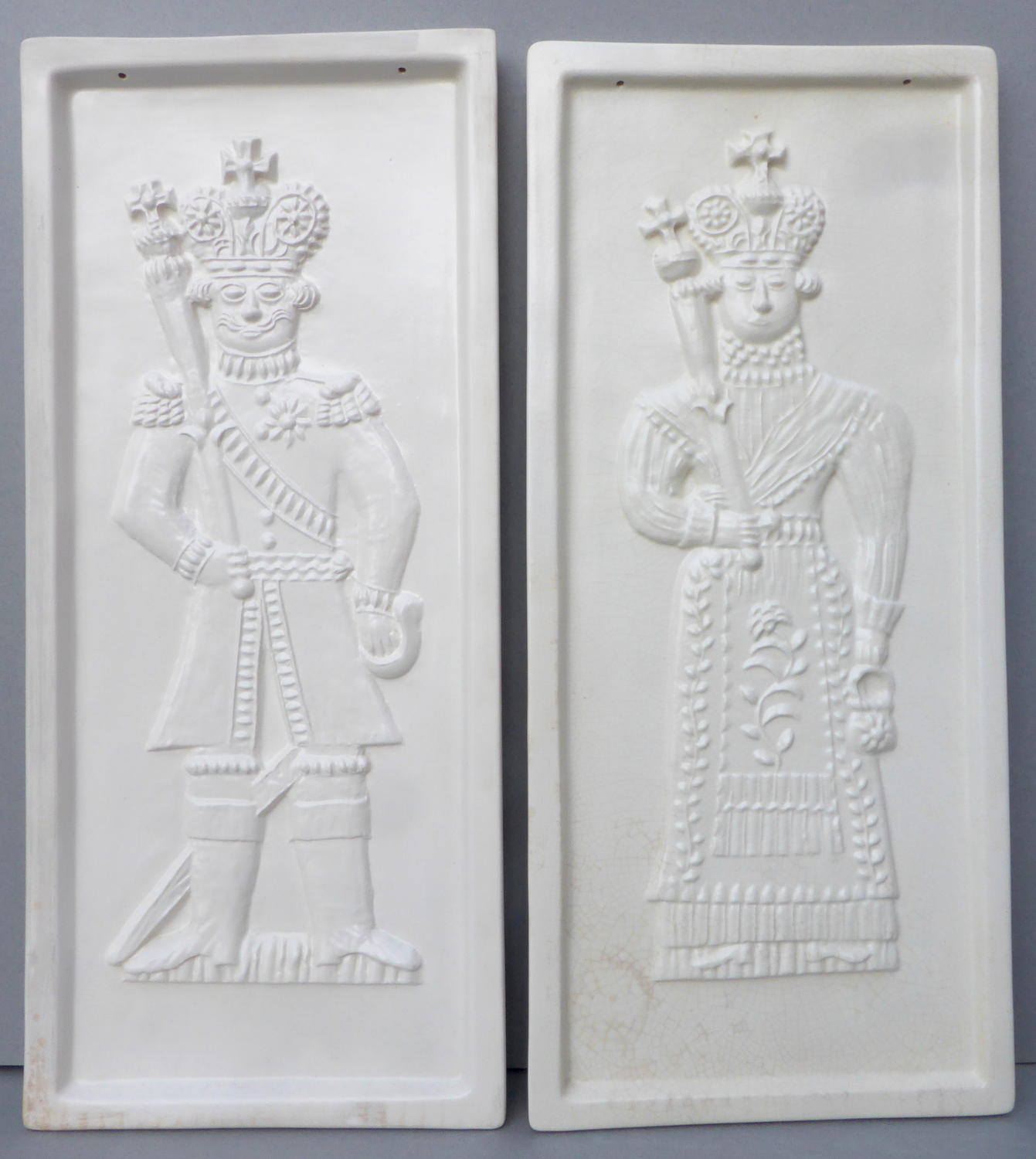Pair of king & queen biscuit mould wall plaques