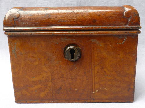 Doll's miniature tin trunk with wood grain finish