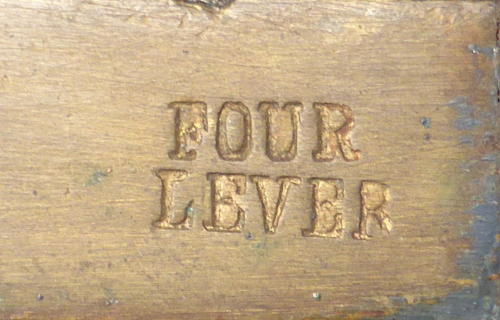 Doll's miniature tin trunk with wood grain finish