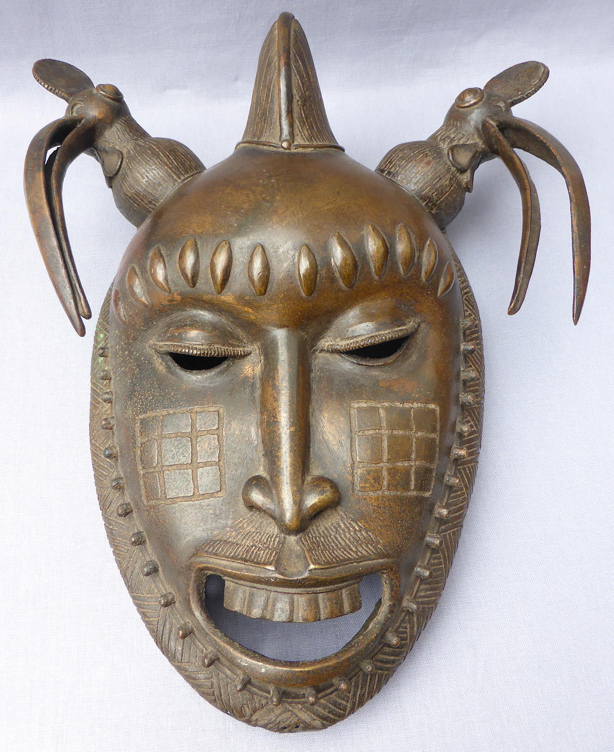 Bronze Baoule ceremonial portrait mask early 20th century