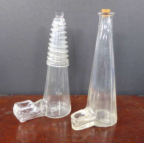 Pair of glass caged bird feeders