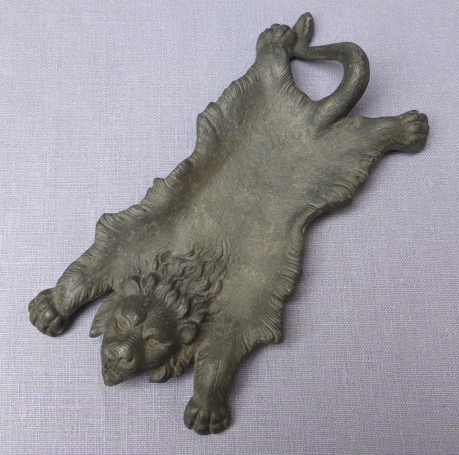 Early 20th century spelter lion skin coin tray