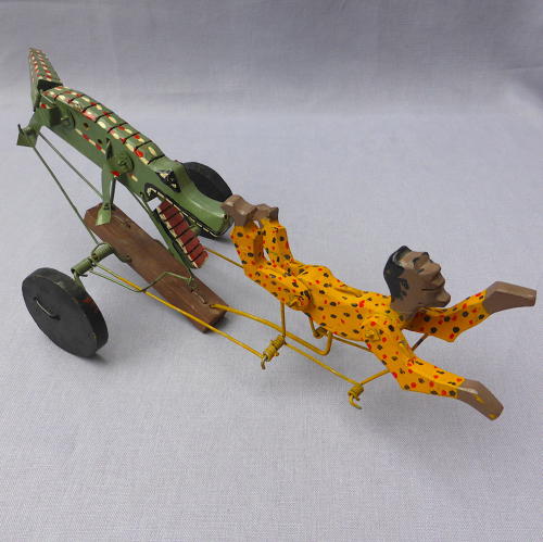 Folk art swimmer & crocodile automaton toy