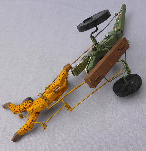 Folk art swimmer & crocodile automaton toy