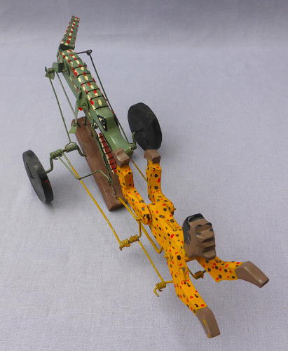 Folk art swimmer & crocodile automaton toy