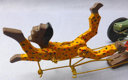 Folk art swimmer & crocodile automaton toy
