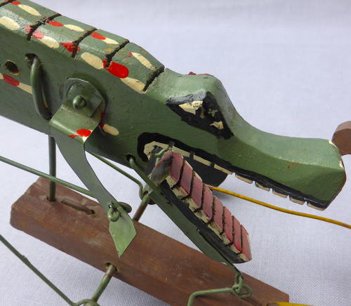 Folk art swimmer & crocodile automaton toy
