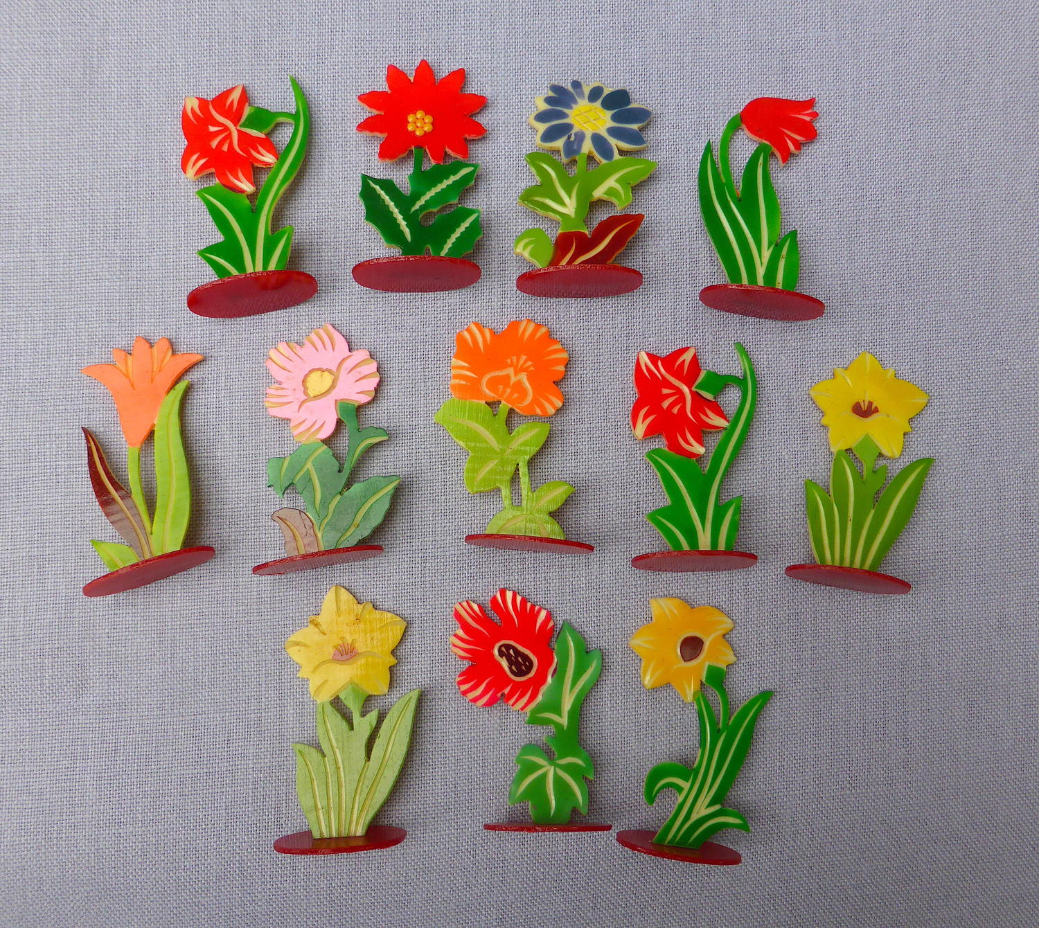 Set of 12 1930s celluloid flower place markers