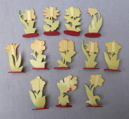 Set of 12 1930s celluloid flower place markers