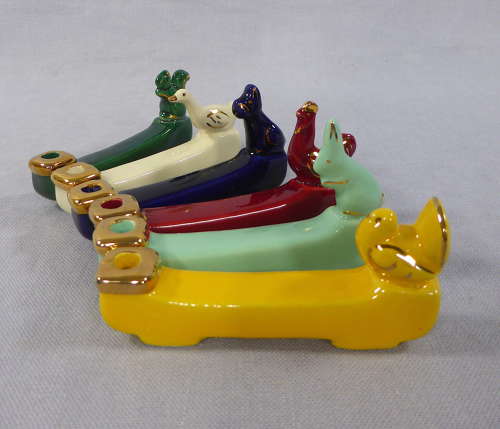 Unusual Knife Rest Candle Holders