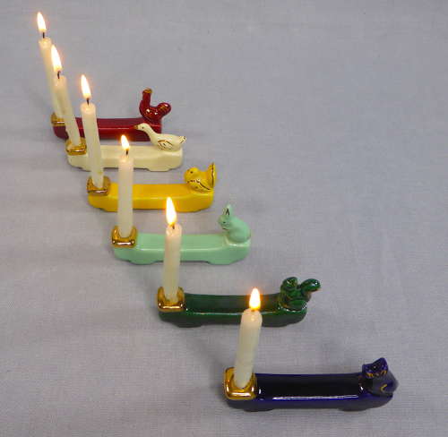 Unusual Knife Rest Candle Holders