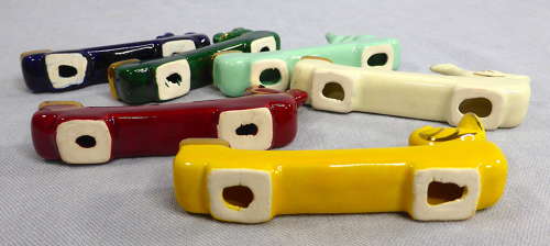 Unusual Knife Rest Candle Holders