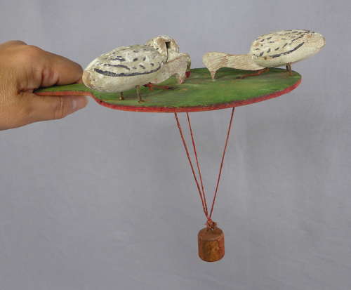 Pecking geese toy