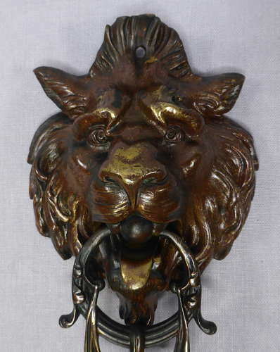 Lion's head door knocker