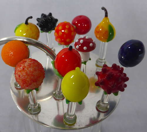 Glass fruits cocktail sticks