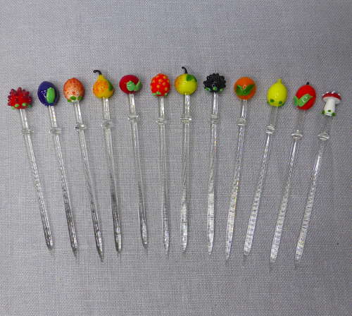 Glass fruits cocktail sticks